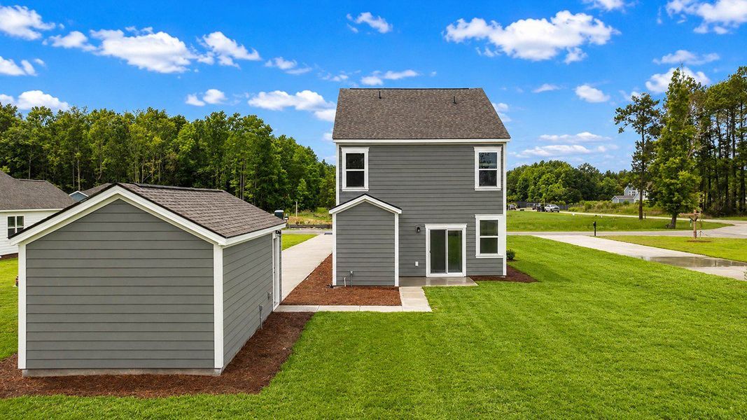 Front exterior of a new home in Rivers Reach, Yemassee, SC, highlighting curb appeal (Image 24).