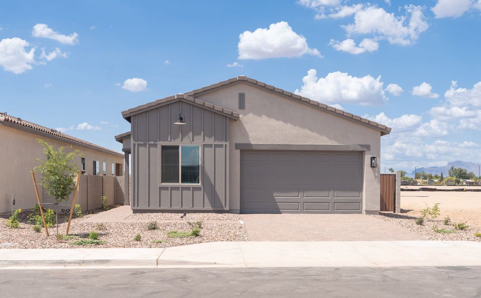 Front exterior of a new home in Terraza, San Tan Valley, AZ, highlighting curb appeal (Image 1). Front exterior of a new home in Terraza, San Tan Valley, AZ, highlighting curb appeal (Image 1).