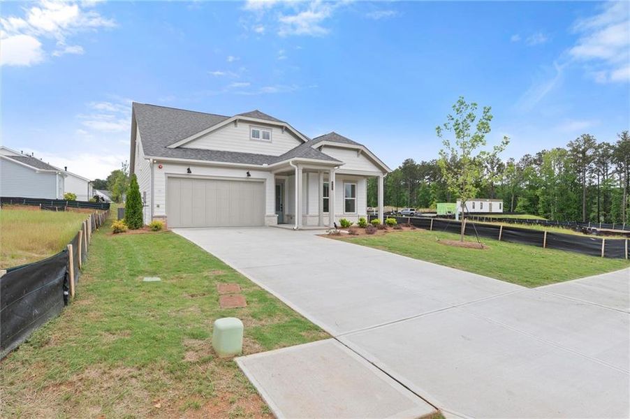Front exterior of a new home in The Reserve at Bells Ferry, Kennesaw, GA, highlighting curb appeal (Image 26).