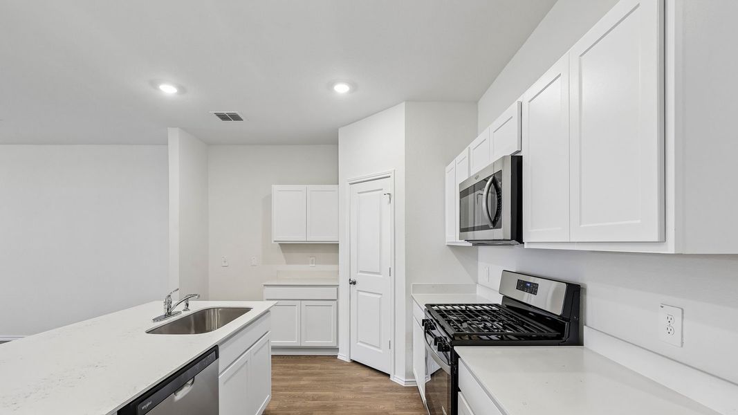 Furnished interior view inside a new home in Wayside, Uhland (Image 10).