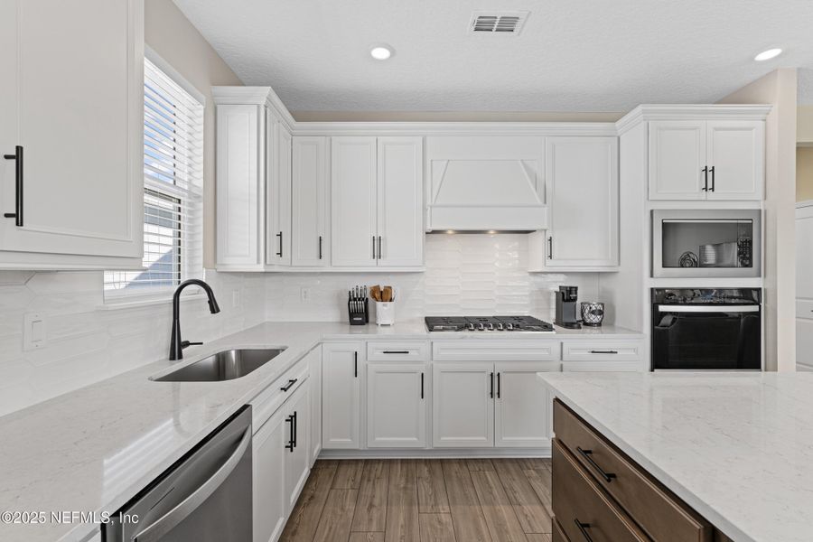 Furnished interior view inside a new home in Summer Bay at Grand Oaks, St. Augustine (Image 11).
