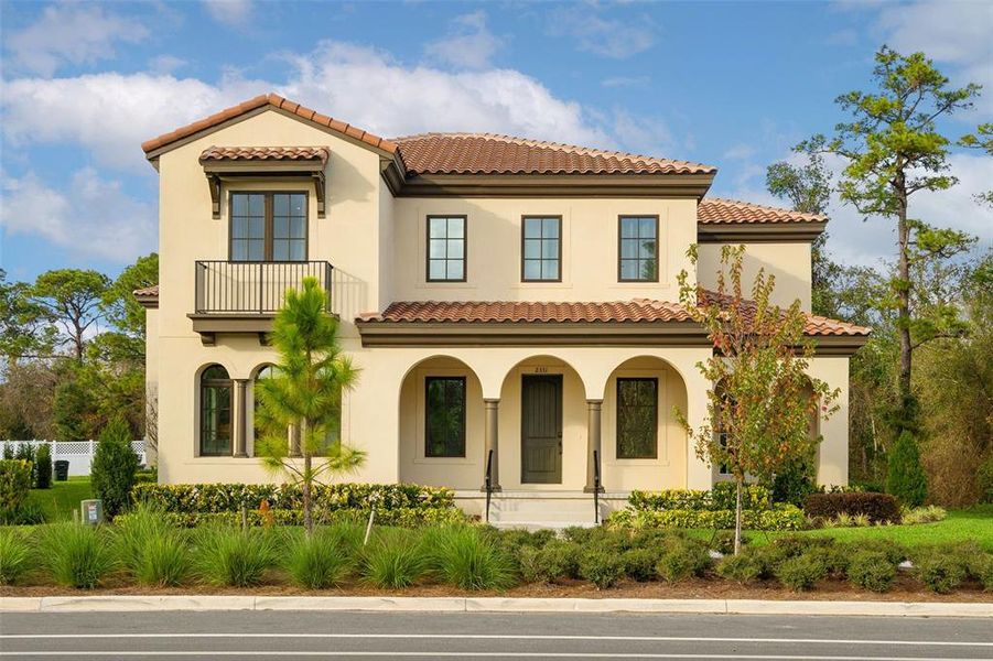 Front exterior of a new home in Celebration - Island Village, Celebration, FL, highlighting curb appeal (Image 29).