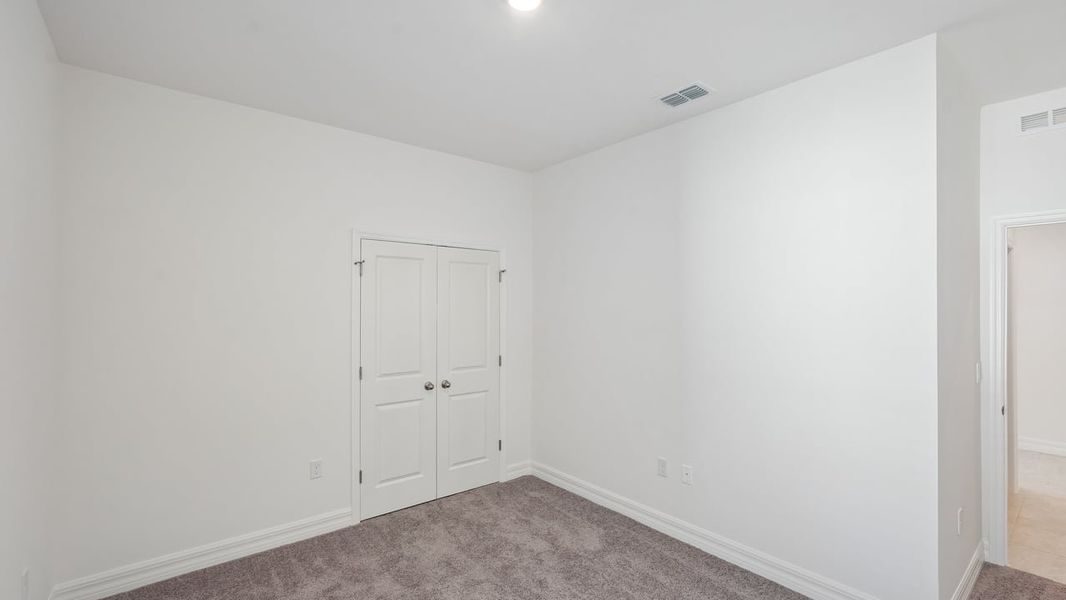 Spacious, unfurnished interior of a new home in Heritage Station, Punta Gorda (Image 44).