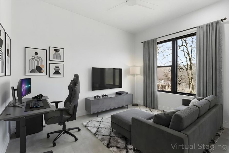 Secondary bedroom virtually staged as an office.