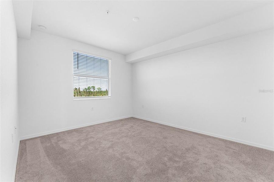 Spacious, unfurnished interior of a new home in Heritage Landing: Veranda Condominiums, Punta Gorda (Image 40).