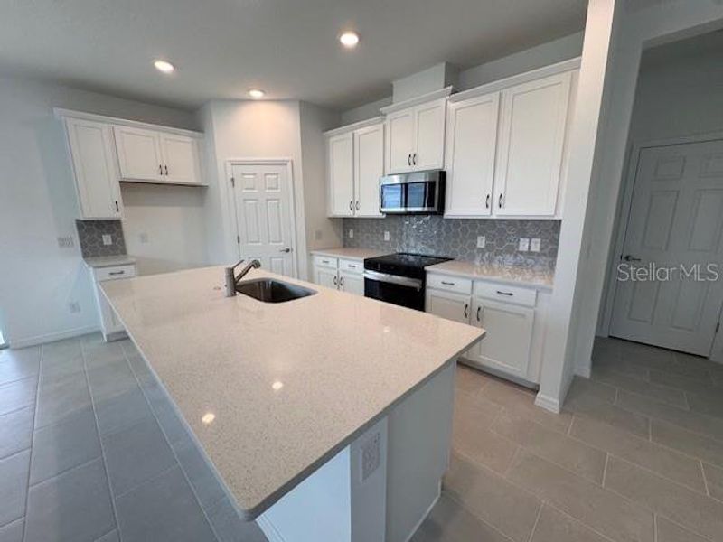 Furnished interior view inside a new home in Cypress Bluff, Groveland (Image 5).