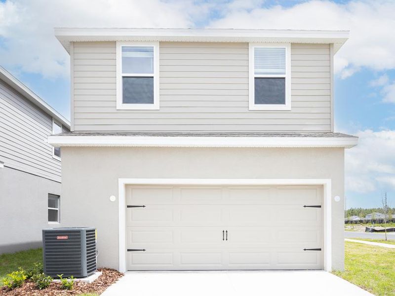 Attached 2-car garage located on the rear of the home with alley access.