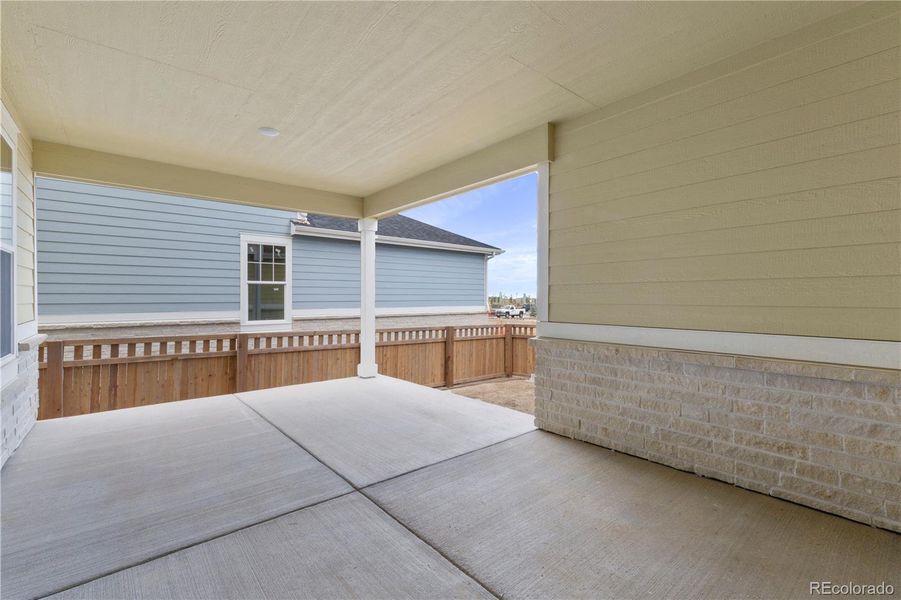 Exterior details and patio area of a home in Windler Single Family Homes, Aurora (Image 2).