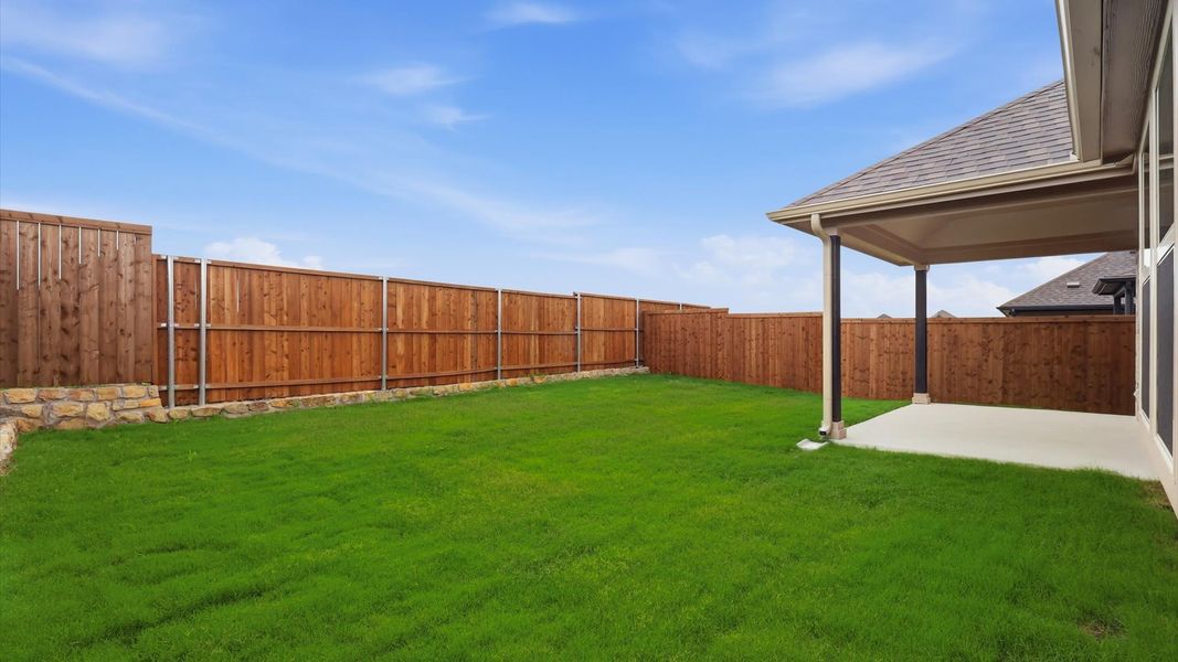Exterior details and patio area of a home in Westridge Journey, Princeton (Image 27).