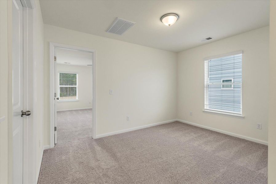 Spacious, unfurnished interior of a new home in The Landings at Montague, Goose Creek (Image 26).