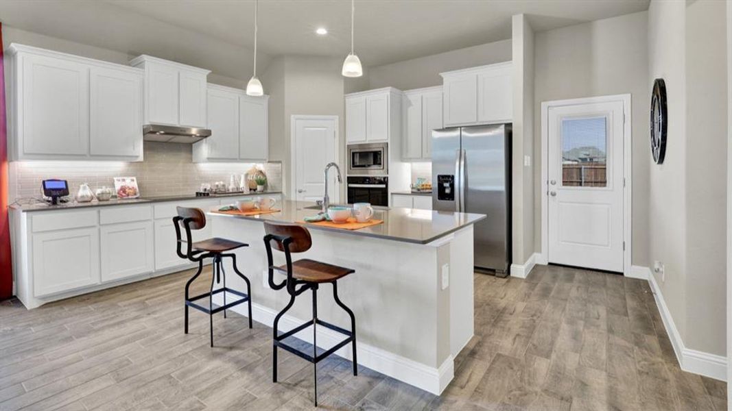 Furnished interior view inside a new home in Lakeview Pointe, Grand Prairie (Image 6).