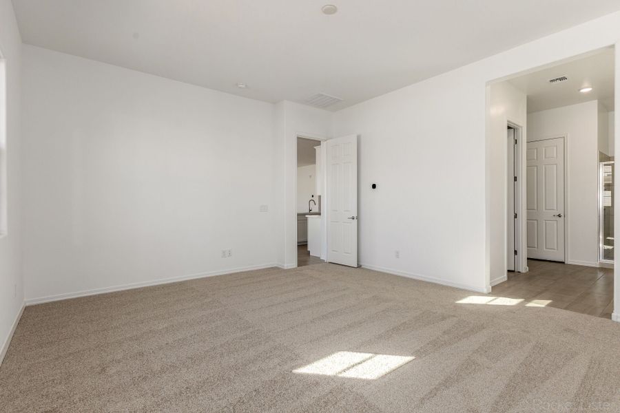 Spacious, unfurnished interior of a new home in Empire Pointe, Queen Creek (Image 12).