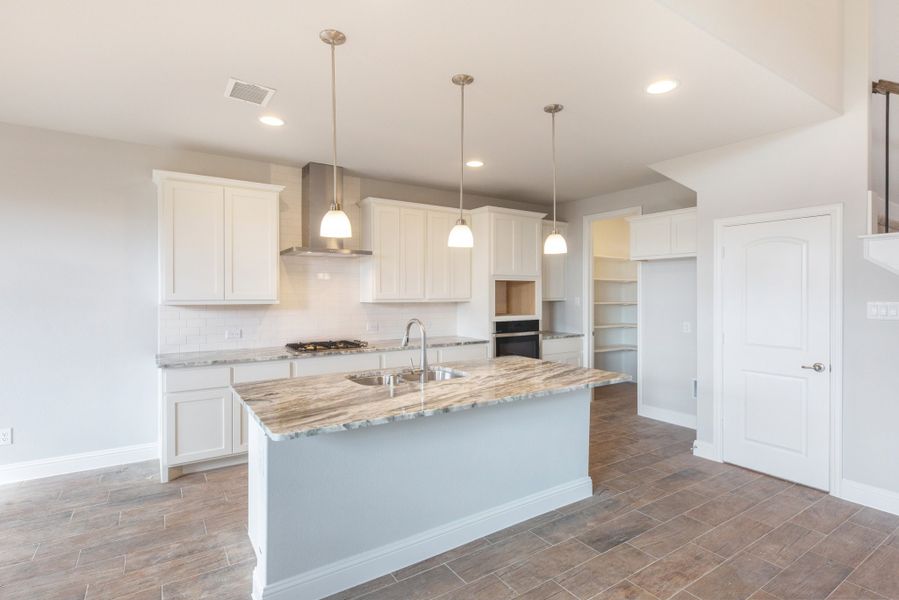 Representative furnished interior of a home built from the Nueces by UnionMain Homes in Lake Breeze, Lavon (Image 12).