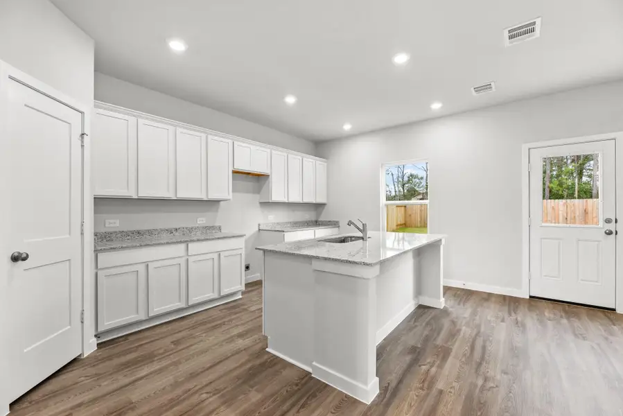 Furnished interior view inside a new home in Crockett Meadows, Cut and Shoot (Image 5).