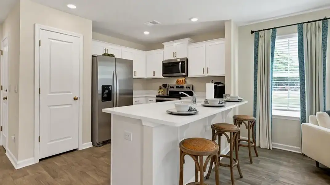 Furnished interior view inside a new home in Hunter's Branch Townhomes, Hopkins (Image 5).