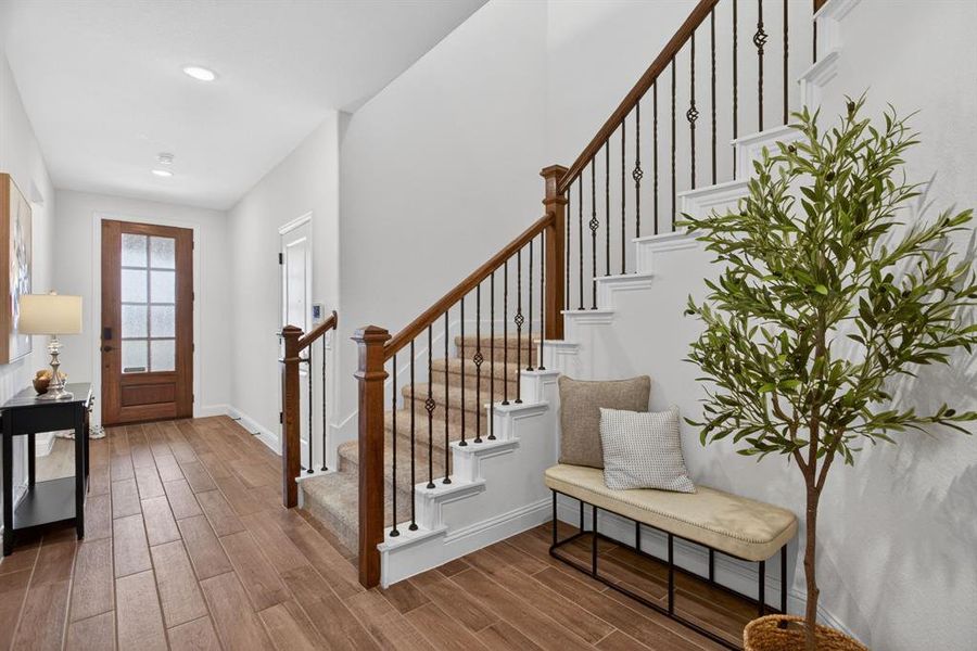 Entryway is so welcoming - wide foyer with niche area for a drop zone. Garage at front right. Entryway is so welcoming - wide foyer with niche area for a drop zone. Garage at front right.