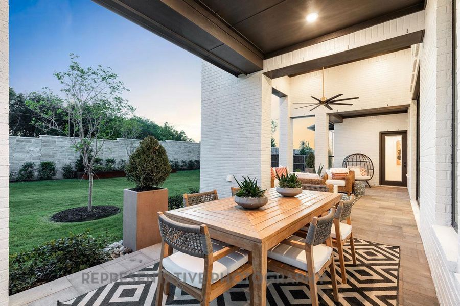 View of patio / terrace featuring a ceiling fan and outdoor dining area
