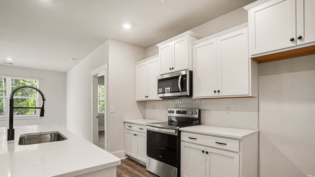 Furnished interior view inside a new home in Chapman Village, Conway (Image 6).