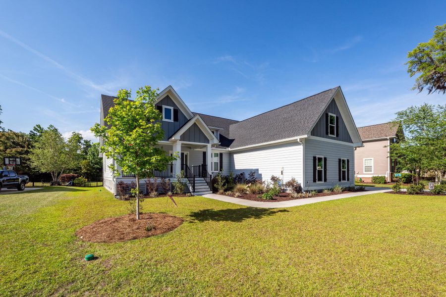 Front exterior of a new home in , Charleston, SC, highlighting curb appeal (Image 23).
