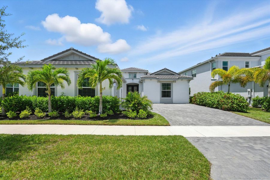Front exterior of a new home in , Westlake, FL, highlighting curb appeal (Image 29).