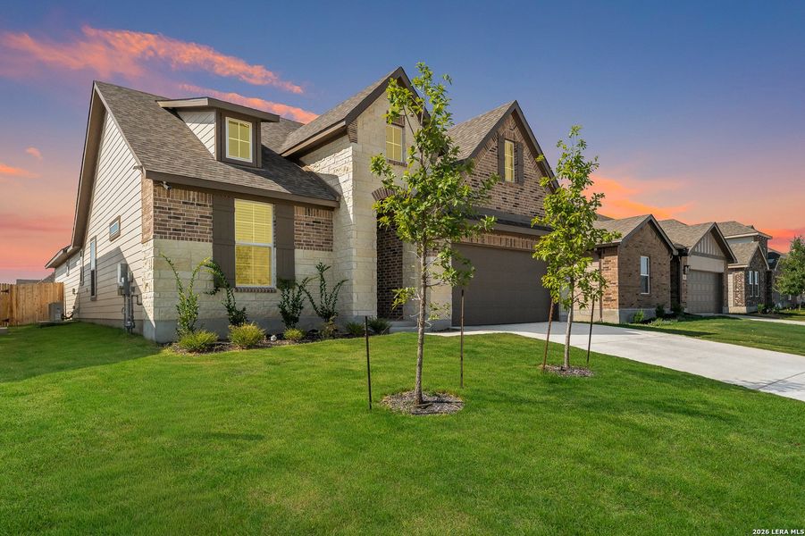 Front exterior of a new home in Westridge, San Antonio, TX, highlighting curb appeal (Image 26).