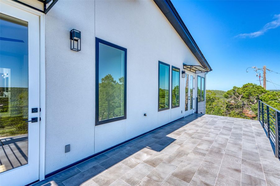 Front exterior of a new home in , Jonestown, TX, highlighting curb appeal (Image 1).