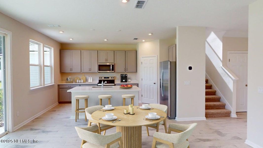 Furnished interior view inside a new home in Sandridge Hills, Green Cove Springs (Image 4).