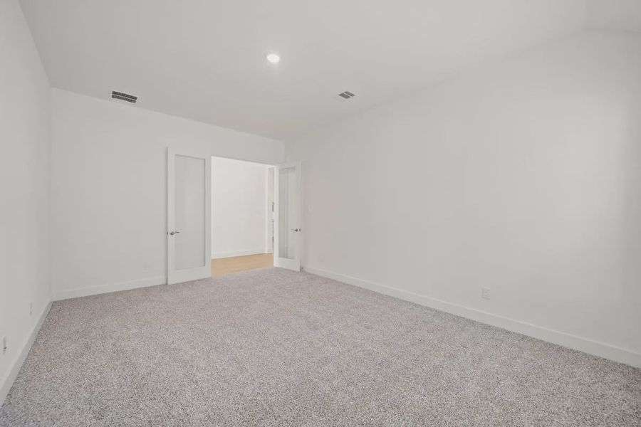 Representative unfurnished interior of a home built from the Mariah by Chesmar Homes in Lakes of Cane Island, Katy (Image 24).