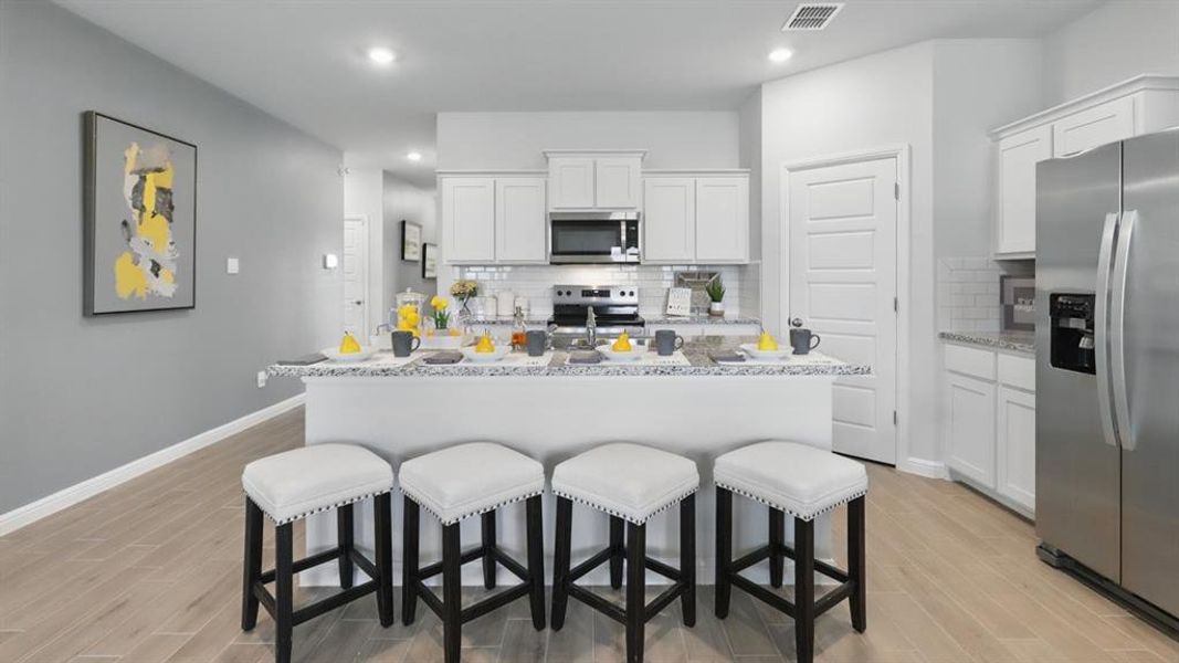 Furnished interior view inside a new home in Monarch at the Meadows, Denton (Image 29). Furnished interior view inside a new home in Monarch at the Meadows, Denton (Image 29).