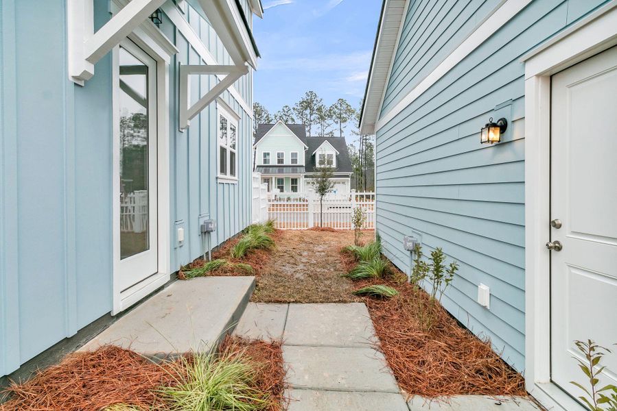 Exterior details and patio area of a home in Midtown at Nexton, Summerville (Image 27).
