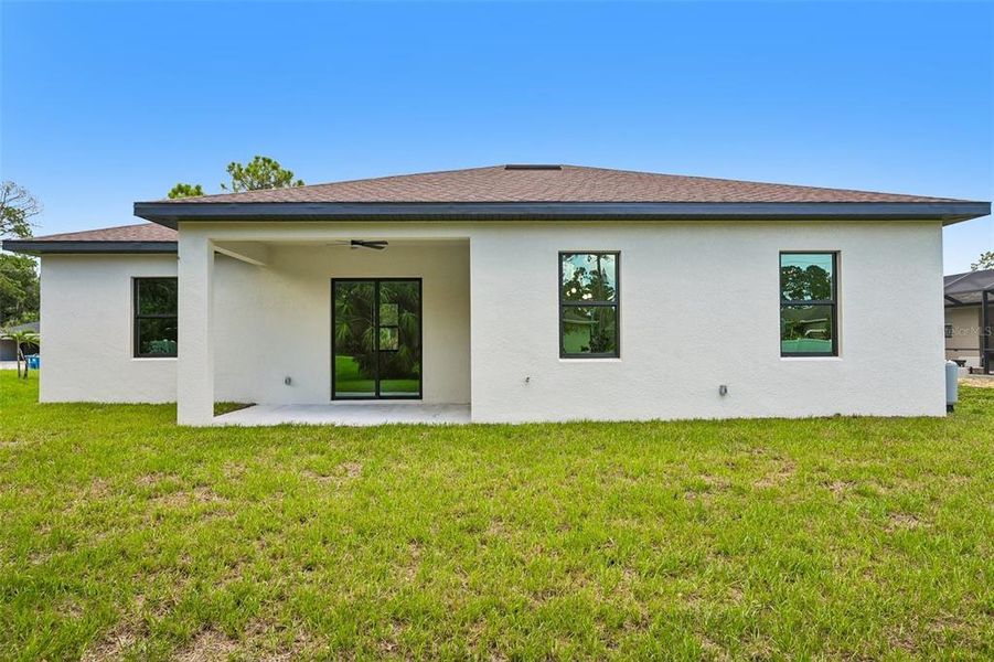 Exterior details and patio area of a home in , North Port (Image 4).