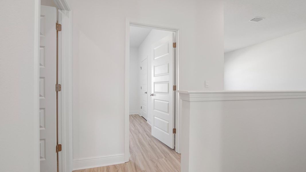 Spacious, unfurnished interior of a new home in Bayside at Ward Creek, Panama City Beach (Image 33).