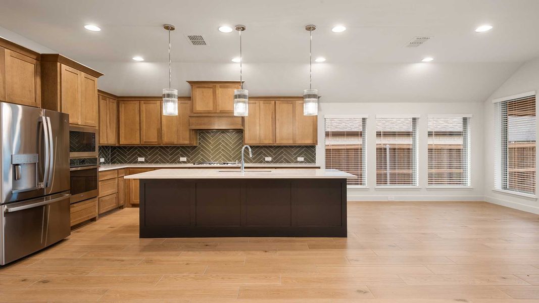 Representative furnished interior of a home built from the 2619W by Perry Homes in Crosswinds, Niederwald (Image 4).