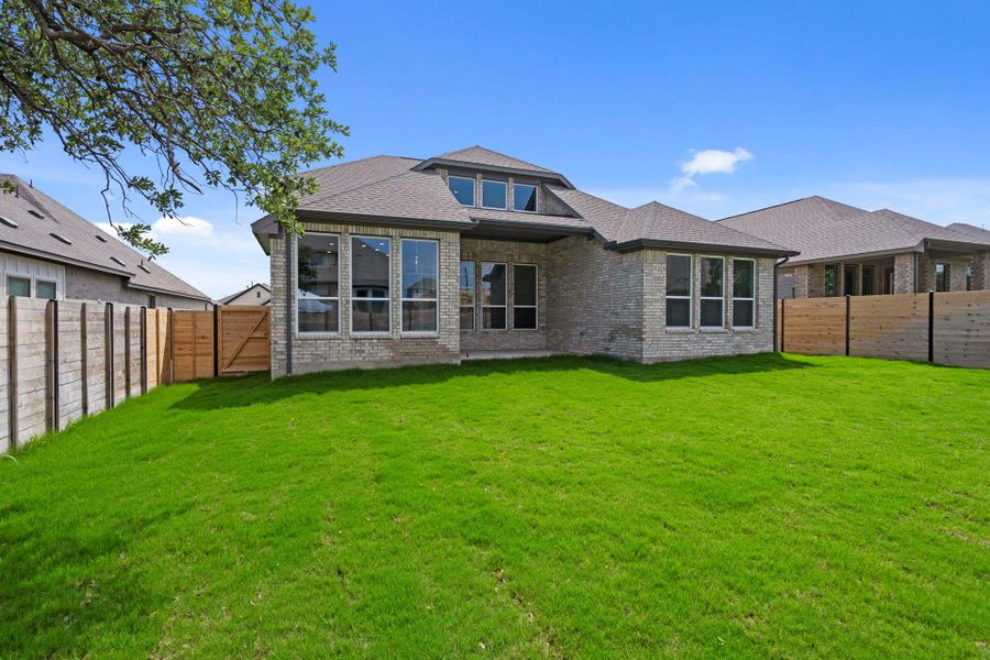 Rear of Home and Private Backyard