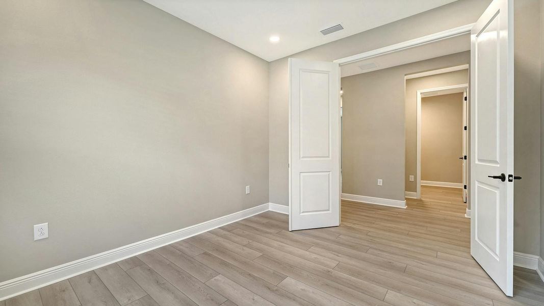 Spacious, unfurnished interior of a new home in Windward Real Estate and Homes for Sale in Sarasota, FL - Neal Communities, Lakewood Ranch (Image 38).