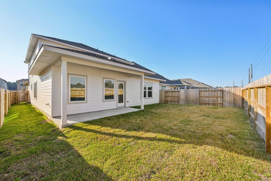 Exterior details and patio area of a home in Landing Meadows - Premier Series, New Caney (Image 3). Exterior details and patio area of a home in Landing Meadows - Premier Series, New Caney (Image 3).