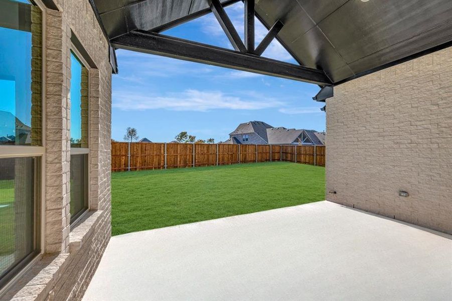 Exterior details and patio area of a home in Kreymer at the Park, Wylie (Image 25).