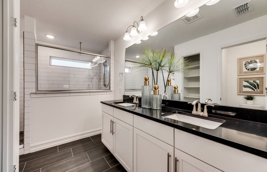 Owner's bath with double vanity and large shower