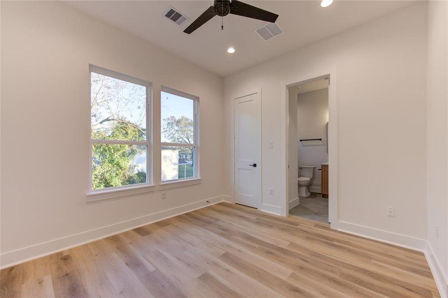 Guest Bedroom 2. Home comes with LED recessed lighting and ceiling fans pre-installed in all rooms.