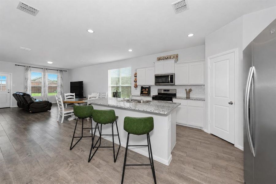 Furnished interior view inside a new home in Springhill South, Boyd (Image 5).