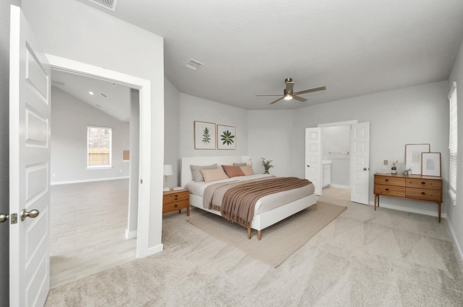 Virtually Staged. Escape to tranquility in this spacious primary room, adorned with plush carpeting and bathed in the soothing hues of warm paint colors, creating a cozy retreat for relaxation. Sample photo of completed home with similar floor plan. As-built interior colors and selections may vary.