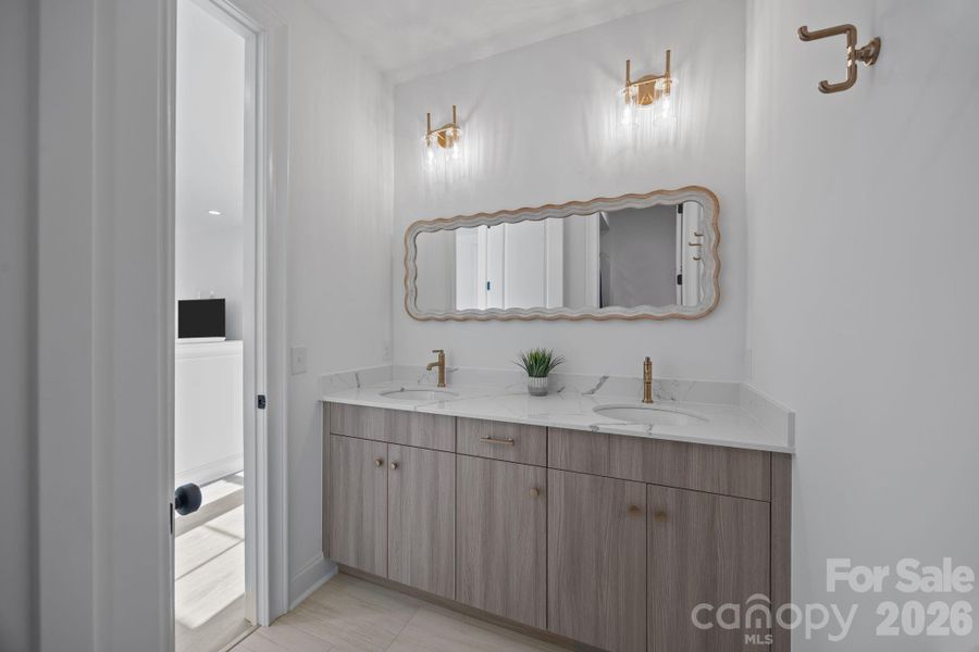 Upstairs hall bath with double sink vanity
