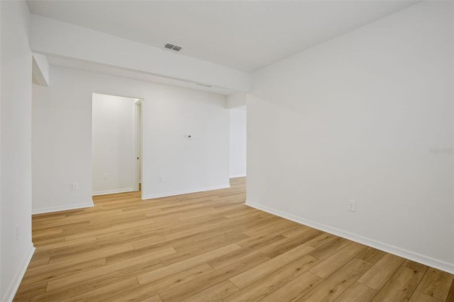 Spacious, unfurnished interior of a new home in Coasterra - Reserve Series, Palmetto (Image 34).