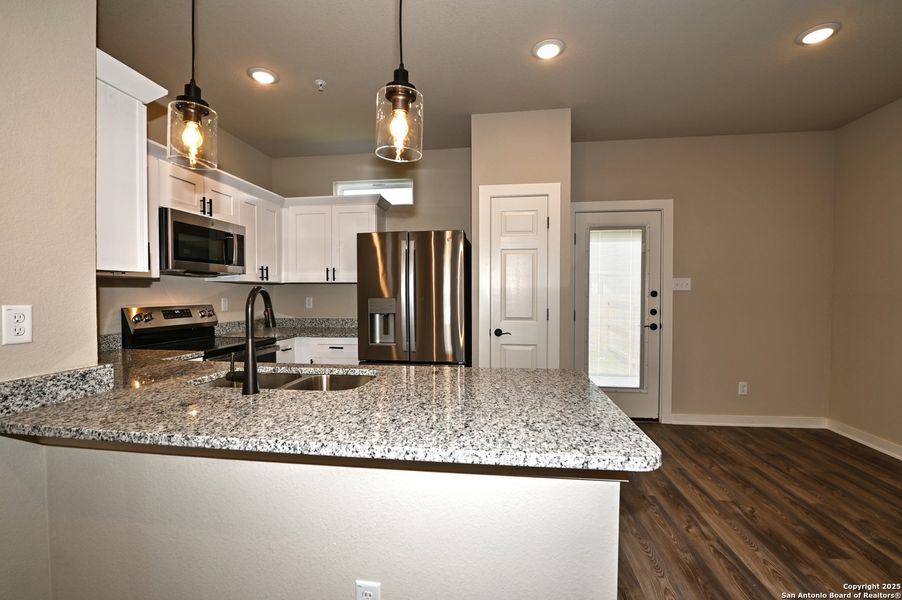 Furnished interior view inside a new home in , San Antonio (Image 4).