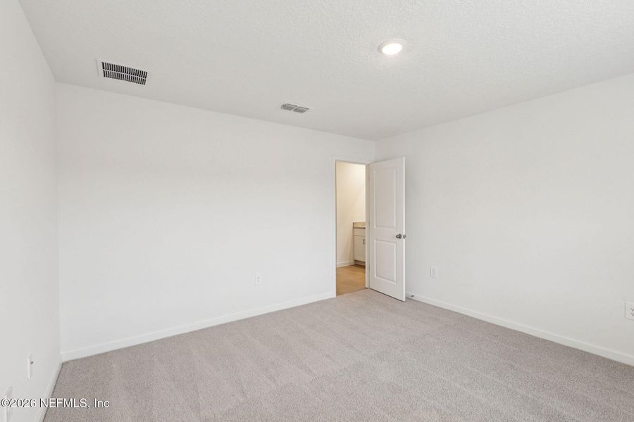 Spacious, unfurnished interior of a new home in Cypress Meadows - Signature Series, Jacksonville (Image 28).