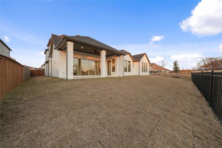 Exterior details and patio area of a home in Light Farms Graham/Reagan, Celina (Image 3).