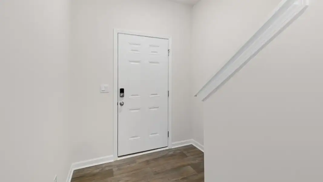 Spacious, unfurnished interior of a new home in The Townes at Galvins Ridge, Sanford (Image 11).