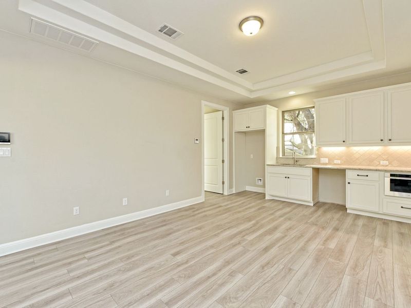 Representative unfurnished interior of a home built from the Casita by Giddens Homes in Whispering Wind, Bertram (Image 54).
