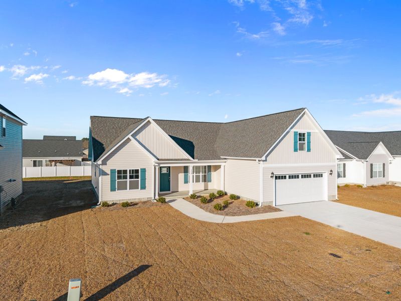Front exterior of a new home in Arbor Hills South II, Greenville, NC, highlighting curb appeal (Image 21).
