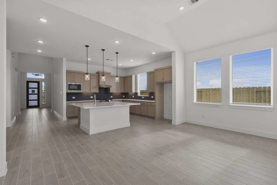 Representative furnished interior of a home built from the Nicklaus by Chesmar Homes in Riceland Alley Loads, Mont Belvieu (Image 14).